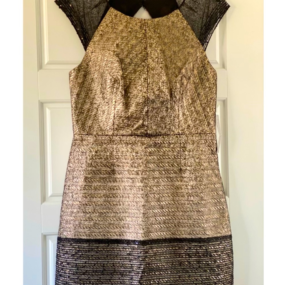 Black and gold cocktail dress by Phoebe